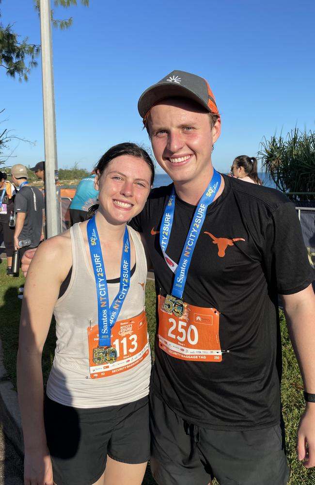 Corrin Demeo, pictured with Jonny Lang, won the women's 12km at the NT City2Surf on Sunday.