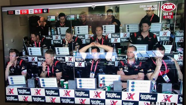 Essendon’s packed coaching box against Sydney on Saturday.