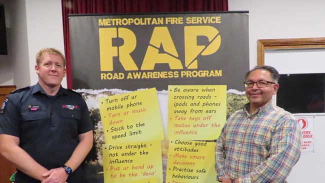 Yudhi Mohan-Ram and MFS Firefighter Josh Byerlee speak to the South-East community about road safety in the wake of the shocking road toll. Picture: Arj Ganesan