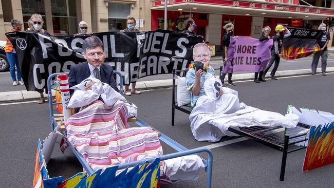 The Extinction Rebellion protest in front of the Santos Building on Flinders Street. Picture: NCA NewsWire / Naomi Jellicoe