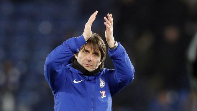 Chelsea's team manager Antonio Conte greets supporters at the end of the English FA Cup quarterfinal soccer match between Leicester City and Chelsea