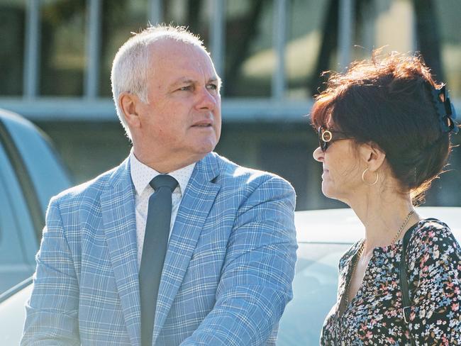 Peter Thomas McDougall (left) with his partner outside Mackay courthouse ahead of his mention on manslaughter charges over a fatal plane crash on December 24, 2021 at Ball Bay.