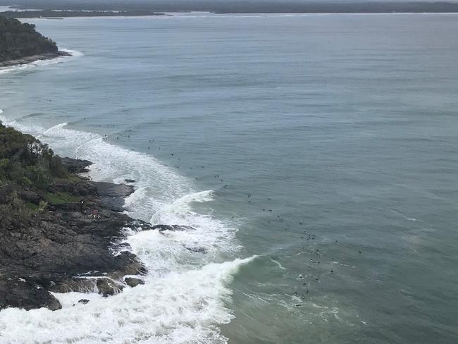 A man is feared dead after being pulled from the water at Dolphin Point in Noosa National Park. Picture: RACQ LifeFlight