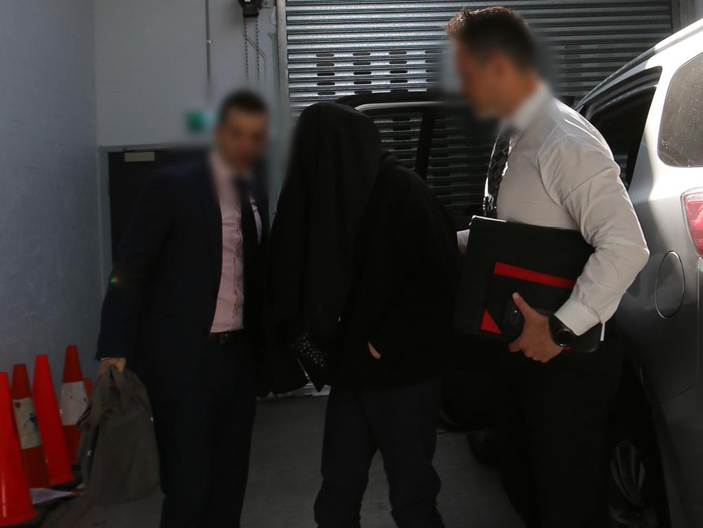 The man hid his face with a jumper. Picture: NSW Police