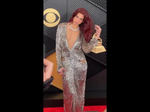 Dua Lipa sparkles on the Grammys red carpet