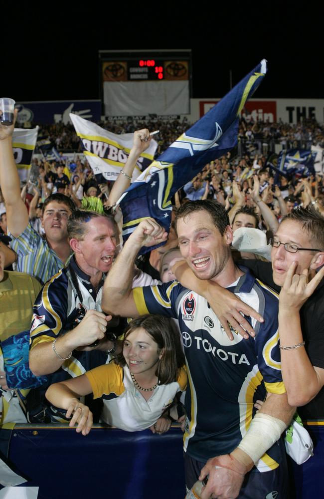 Paul Bowman celebrates with fans.