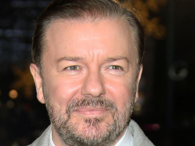 FILE - In this Dec. 15, 2014 file photo, actor Ricky Gervais poses for photographers upon arrival for the premiere of the film "Night at the Museum, Secret of the Tomb" in London. Netflix has acquired a feature film written and directed by Ricky Gervais to debut next year, adding to the streaming service’s growing roster of original films. The deal was announced Monday, April 6, 2015. In the satirical comedy, titled “Special Correspondents,” Eric Bana plays a struggling radio journalist who files fake war reports from New York. (Photo by Joel Ryan/Invision/AP, File)