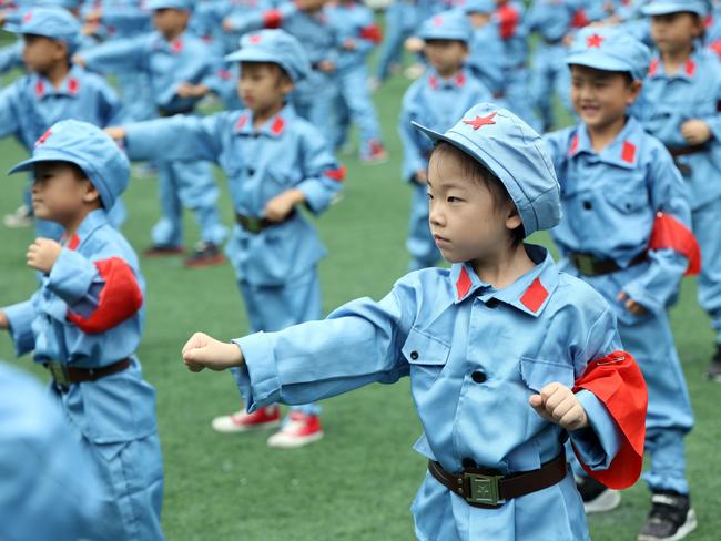 JIANGSU, CHINA - SEPTEMBER 22: (CHINA MAINLAND OUT)Young children wear the red army's uniform and playing military boxing to welcome the National Day on 22th September, 2020 in Nantong,Jiangsu,China(Photo by TPG/Getty Images)