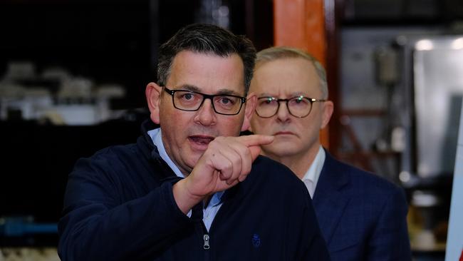 Victorian Premier Daniel Andrews (left) makes a forceful point at a Melbourne press conference alongside Opposition Leader Anthony Albanese. Picture: NCA NewsWire / Luis Enrique Ascui