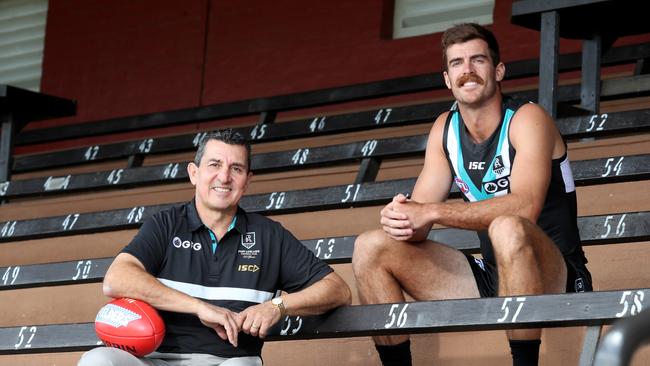 David Hutton has returned to Port Adelaide – 12 years after leaving the club. He is pictured at Alberton with Power ruckman Scott Lycett. Picture: AAP/Kelly Barnes