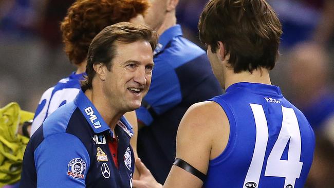 Luke Beveridge speaking to Rhylee West during his AFL debut. Picture: Michael Klein