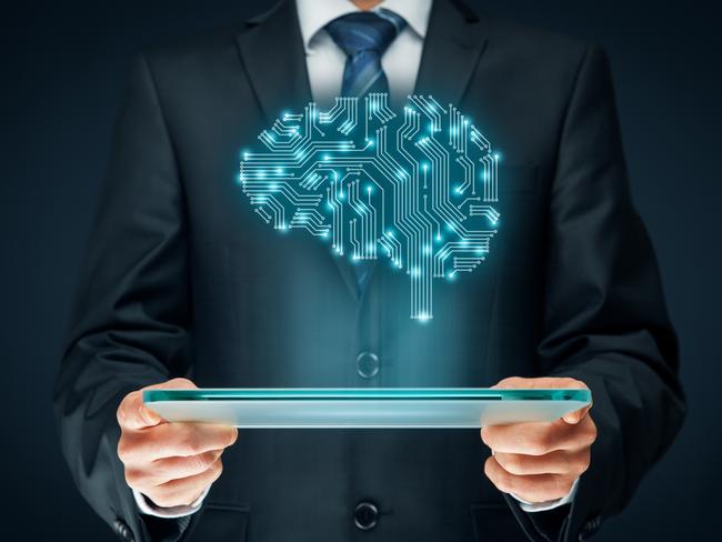 Artificial intelligence (AI), data mining, expert system software, genetic programming, machine learning, deep learning, neural networks and another modern computer technologies concepts. Brain representing artificial intelligence with printed circuit board (PCB) design. Istock