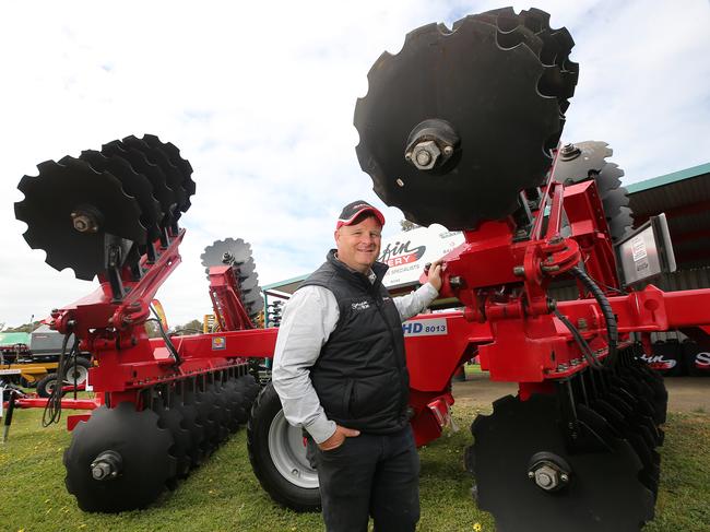 Plated up: Serafin sales manager Rodney Dunn with the disc harrow at Henty. Picture: Yuri Kouzmin