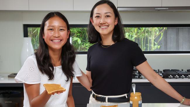 Stella Ng who has beat her peanut allergy with mother Ju Le Ng Picture: Brendan Beckett