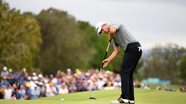 Australian golfer Adam Scott putts on the 18th before winning the 2019 Australian PGA Championship at the RACV Royal Pines Resort. AAP Image/Dan Peled