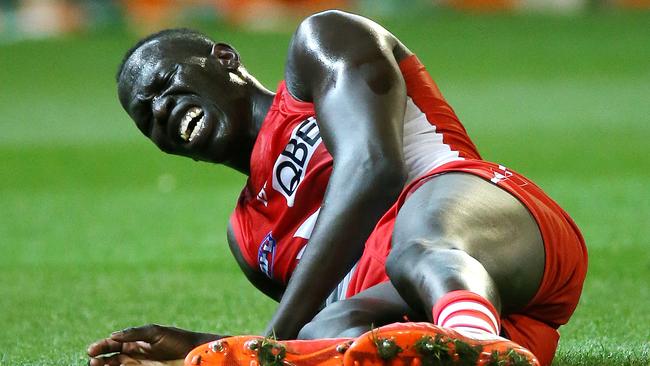 Aliir Aliir went down with injury late in the first quarter and played no further part in the preliminary final win. Picture: George Salpigtidis