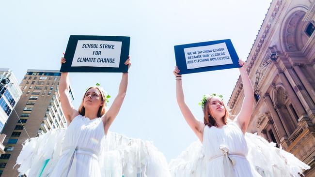 The 'Climate Angels' outside Victorian parliament. Picture: Julian Meehan