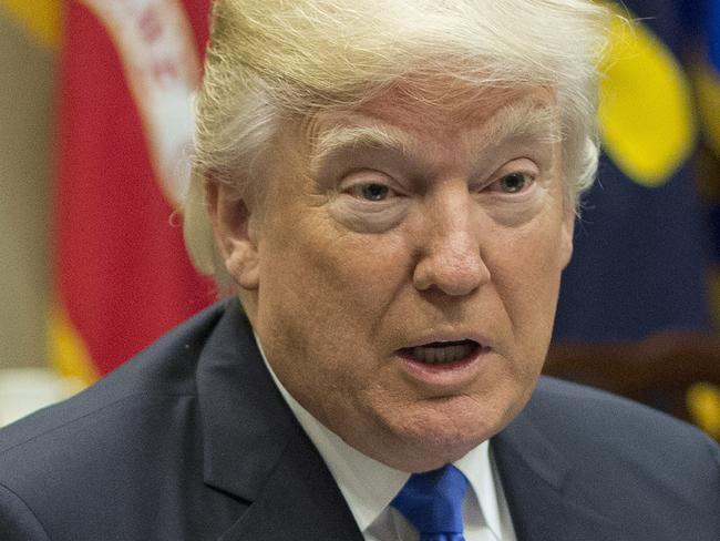 President Donald Trump speaks during his meeting with automobile leaders in the Roosevelt Room of the White House in Washington, Tuesday, Jan. 24, 2017. Trump, despite occupying the most powerful office in the world, remains fixated on a belief that the legitimacy of his election is being challenged. (AP Photo/Pablo Martinez Monsivais)