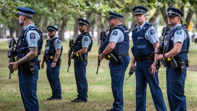 Police officers carrying automatic rifles guard the area near Al Noor mosque. Picture: Getty 