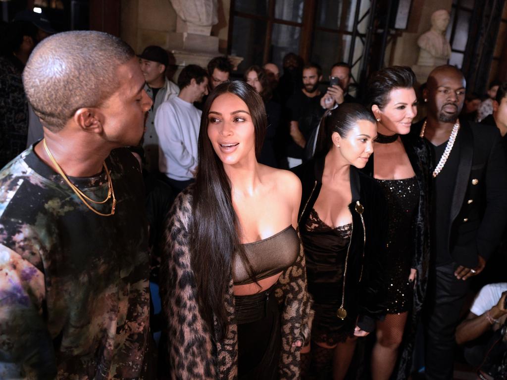 Kanye West, Kim Kardashian, Kourtney Kardashian, Kris Jenner and Corey Gamble attend the Off-white 2017 Spring/Summer ready-to-wear collection fashion show, on September 29, 2016 in Paris. Picture: AFP