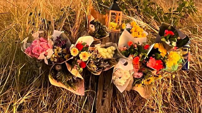 Flowers mark the spot where Riley Martin died.