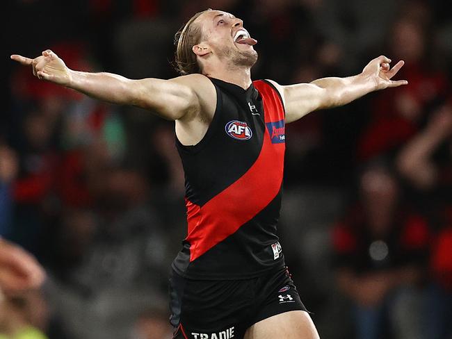 MELBOURNE . 09/04/2023.  AFL . Round 4. Essendon vs Greater Western Sydney at Marvel Stadium.   Mason Redman of the Bombers  celebrates a 3rd quarter goal . Pic: Michael Klein