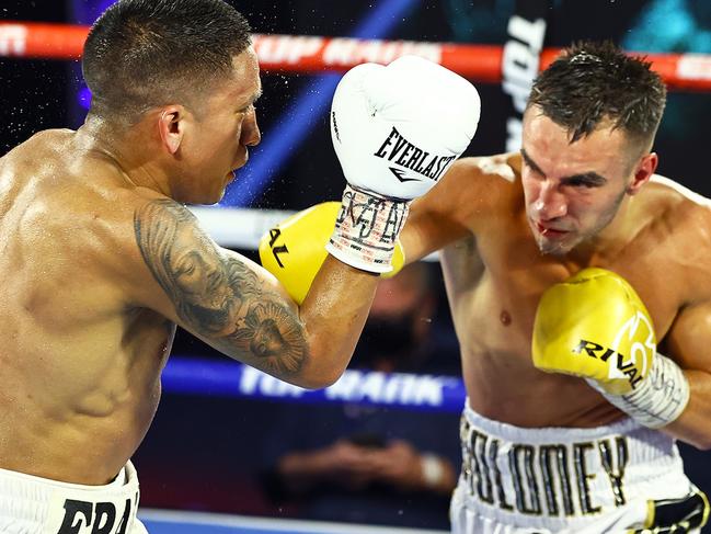 LAS VEGAS, NEVADA - JUNE 23: In this handout image provided by Top Rank, Andrew Moloney punches Joshua Franco during their WBA Super-Flyweight World Title fight at MGM Grand Conference Center Grand Ballroom on June 23, 2020 in Las Vegas, Nevada. (Photo by Mikey Williams/Top Rank via Getty Images)