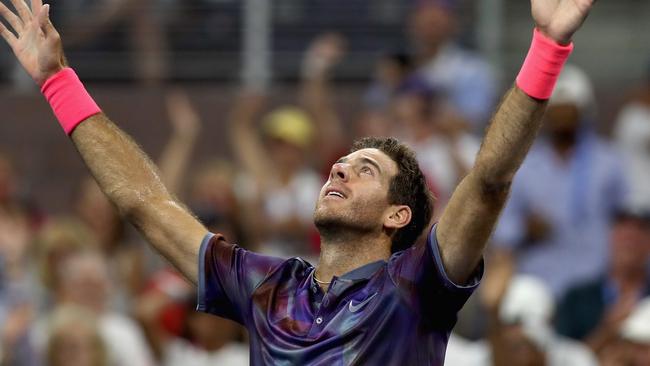 Juan Martin del Potro of Argentina celebrates after defeating Dominic Thiem of Austria.