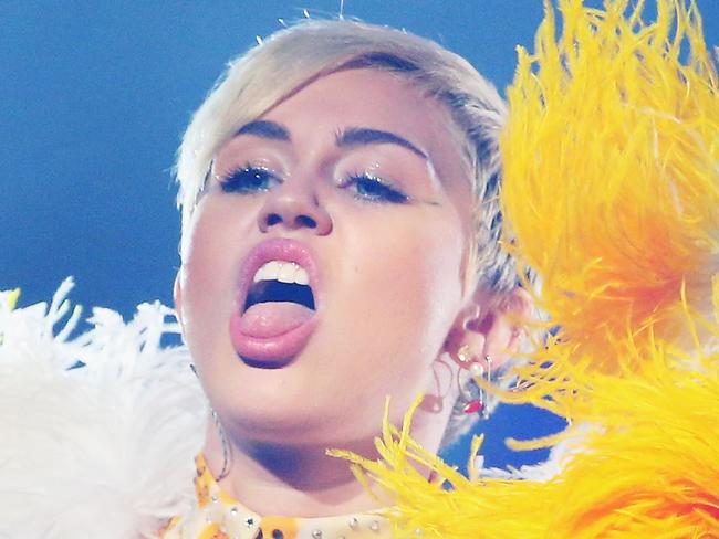 MELBOURNE, AUSTRALIA - OCTOBER 10: Miley Cyrus performs at the opening night of her Bangerz Tour in Australia at Rod Laver Arena on October 10, 2014 in Melbourne, Australia. (Photo by Scott Barbour/Getty Images)