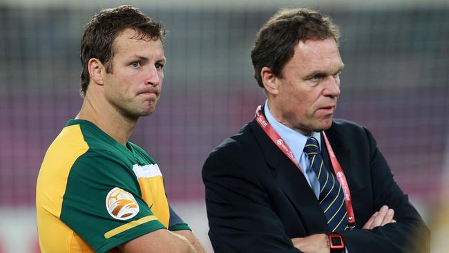 Lucas Neill and Holger Osieck look grim after the 2011 Asian Cup final loss to Japan.