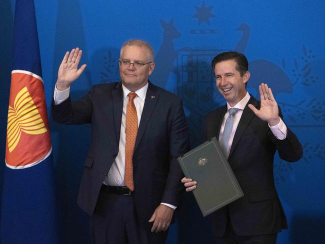 Prime Minister Scott Morrison with Trade Minister Simon Birmingham signify the Regional Comprehensive Economic Partnership trade deal. Picture: NCA NewsWire /Gary Ramage