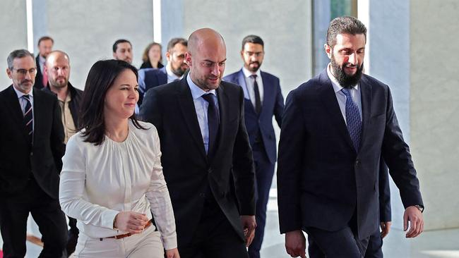 Syria’s Ahmed al-Sharaa, right, formerly called Abu Mohammed al-Jawlani, met Friday with German Foreign Minister Annalena Baerbock and French Foreign Minister Jean-Noël Barrot in Damascus. Picture: AFP PHOTO / HO / SANA