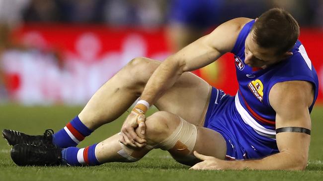 It was a sad sight on Marvel Stadium when Bulldogs favourite son Dale Morris went down with a knee injury in his AFL comeback. Picture: AFL Photos