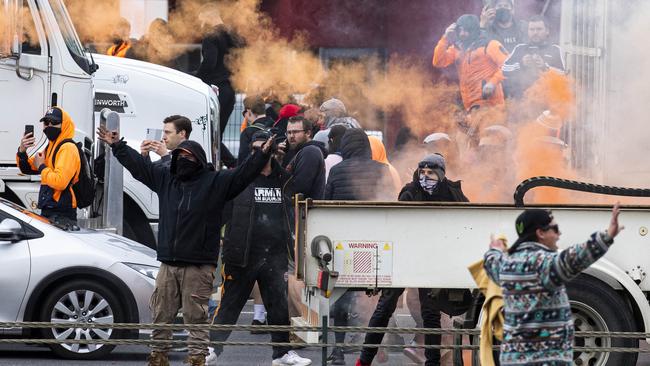 Protesters clash with riot police after closing the West Gate Bridge. Picture: Aaron Francis