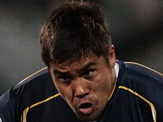 CANBERRA, AUSTRALIA - MAY 31: Jarrad Butler of the Brumbies is tackled during the round 16 Super Rugby match between the Brumbies and the Rebels at Canberra Stadium on May 31, 2014 in Canberra, Australia. (Photo by Stefan Postles/Getty Images)