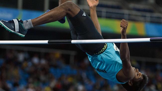 India's Mariyappan Thangavelu jumps in the men's final high jump — T42.