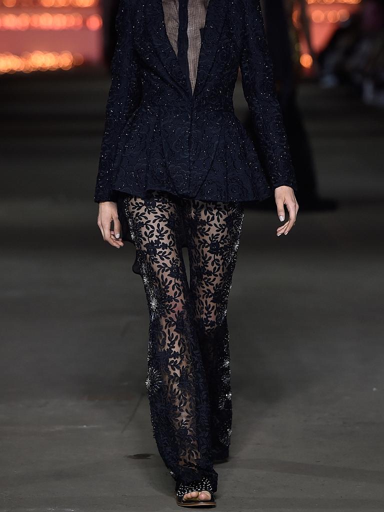 A model walks the catwalk at the AJE show at Mercedes-Benz Fashion Week Australia 2015. Picture: Getty