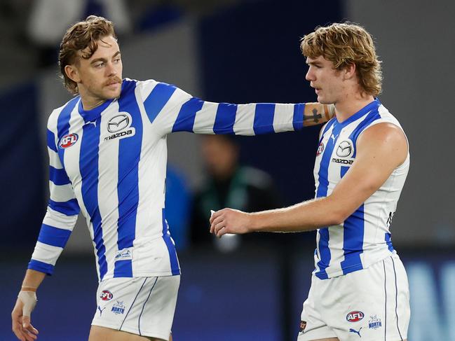 MELBOURNE, AUSTRALIA - JUNE 12: Hugh Greenwood (left) and Jason Horne-Francis of the Kangaroos look on during the 2022 AFL Round 13 match between the North Melbourne Kangaroos and the GWS Giants at Marvel Stadium on June 12, 2022 in Melbourne, Australia. (Photo by Michael Willson/AFL Photos via Getty Images)