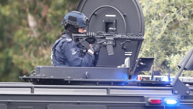 SOG officers surrounded the home. Picture: David Crosling