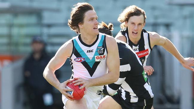 Port Adelaide's Jared Polec dashes away. Pic: Michael Klein