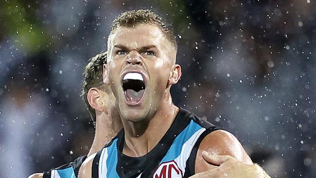 Port Adelaide's Dan Houston celebrates kicking a goal  during the AFL Gather Round match between Port Adelaide and the Western Bulldogs at the Adelaide Oval on April 15, 2023.  Photo by Phil Hillyard(Image Supplied for Editorial Use only - **NO ON SALES** - Â©Phil Hillyard )