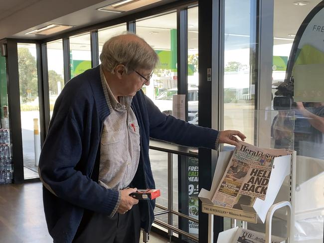 George Pell is seen buying a copy of the Herald Sun newspaper at the Glenrowan North Truckstop. Picture: Paul Dowsley/Seven News