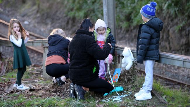 Floral tributes to a baby girl killed after being hit by a train at Upwey continue to grow. Picture: Rebecca Michael.