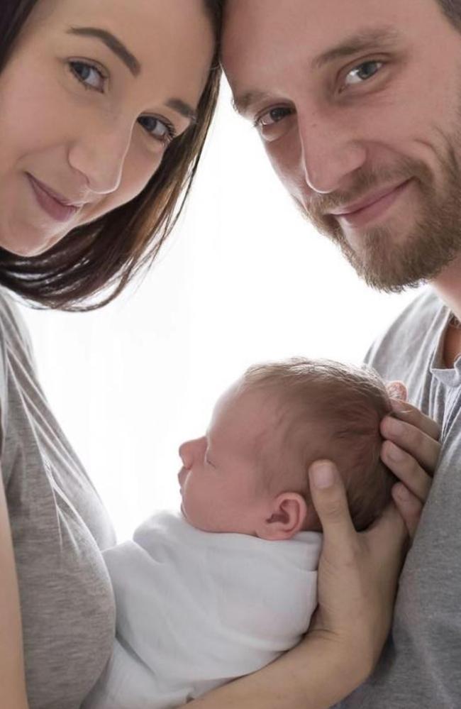 Jessica and Jack Bristow holding their daughter Layla.