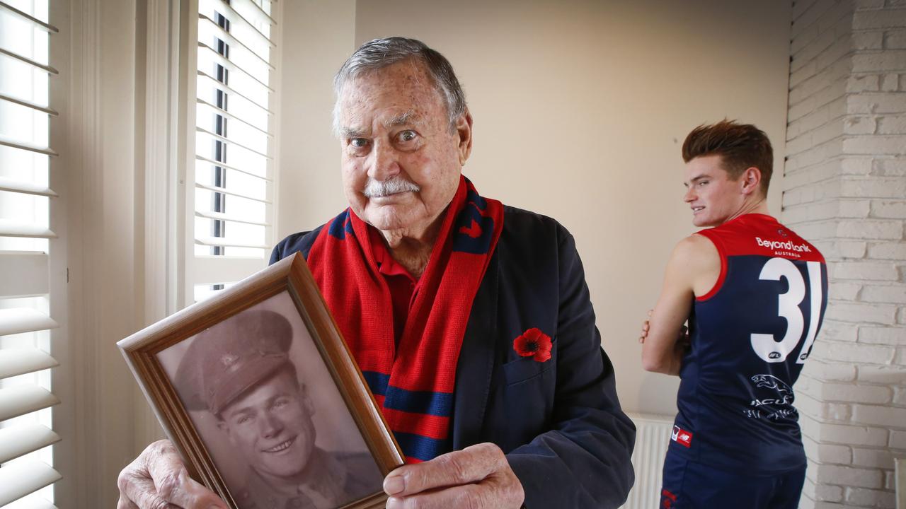 Ron Barassi with Melbourne’s current No. 31 Bayley Fritsch. Picture: David Caird