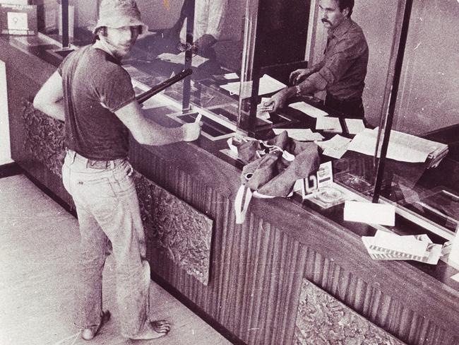 A bandit goes barefoot in a robbery at a Middle Park bank in 1980.