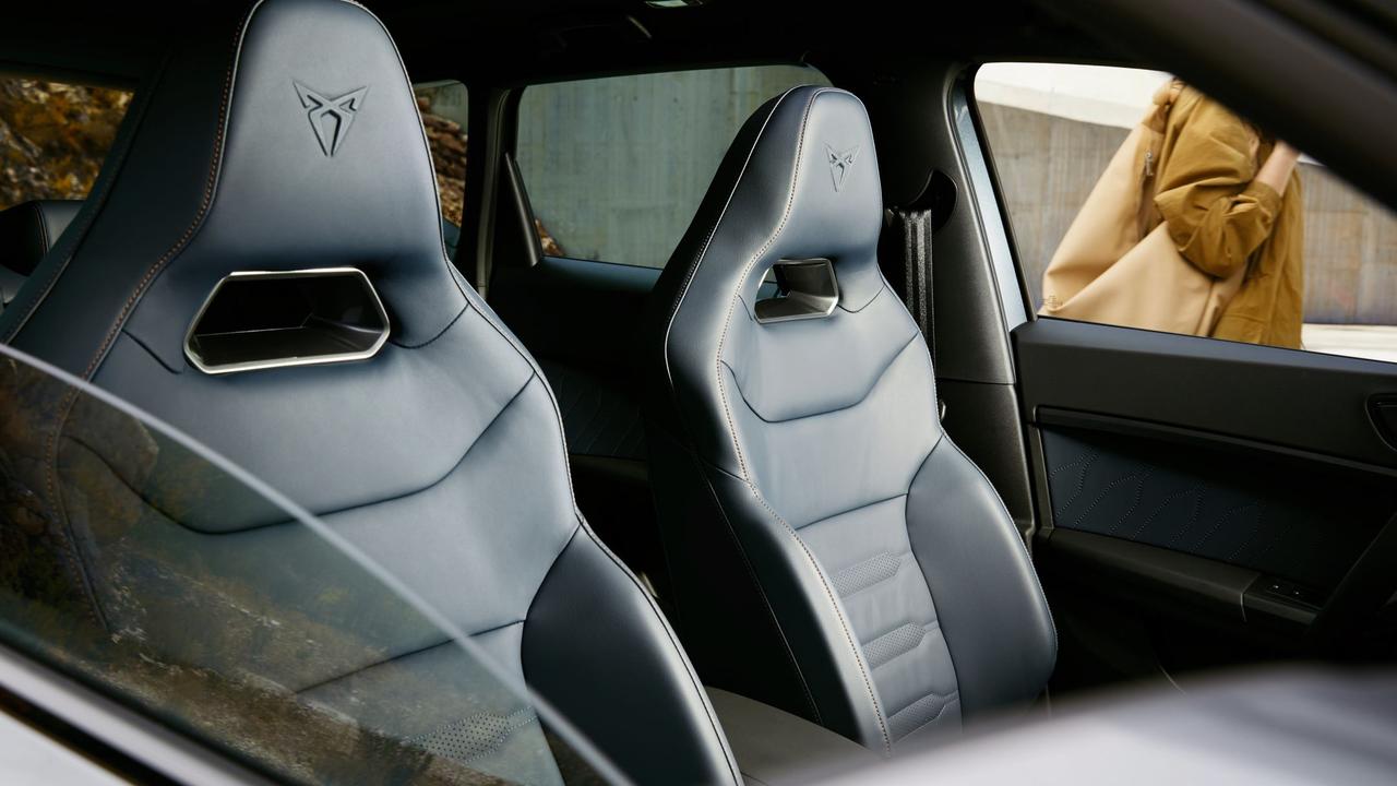 There are sporty touches throughout the vehicle, including well bolstered bucket seats.