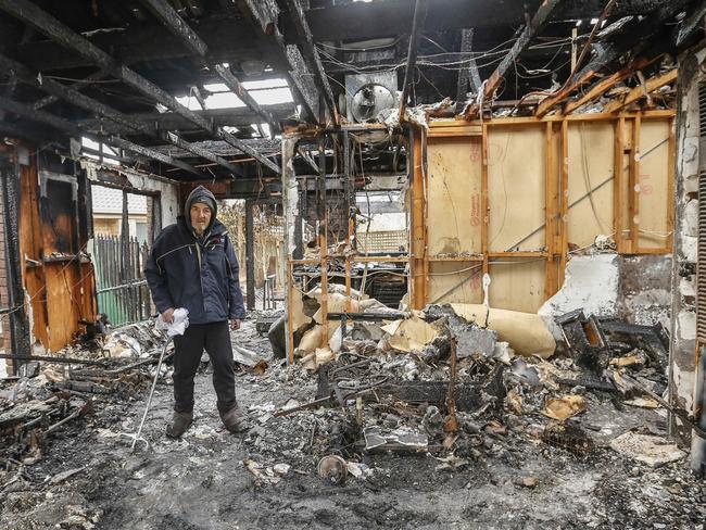 Greg Hehir surveys the damage at his Somerville home, destroyed in a blaze on June 29. Picture: Valeriu Campan