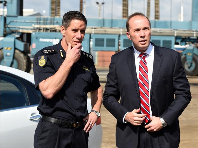 Immigration Minister Peter Dutton (right) and Australian Border Force commissioner Roman Quaedvlieg prepare inspect the yacht Solay in Brisbane, Thursday, Sept. 3, 2015. Seventy kilograms of cocaine was seized by authorities when the boat berthed at Coomera on the Gold Coast last week. (AAP Image/Dan Peled) NO ARCHIVING