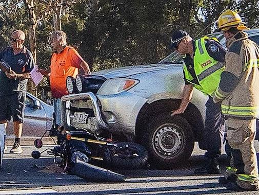 A man is in hospital after his motorbike became lodged under a ute. Picture: Nigel Hallett